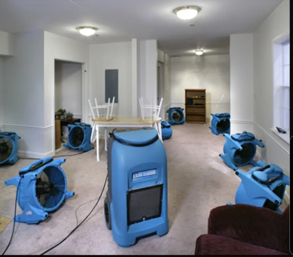 Air movers and dehumidifier setup for Water Damage Restoration in Middleburg